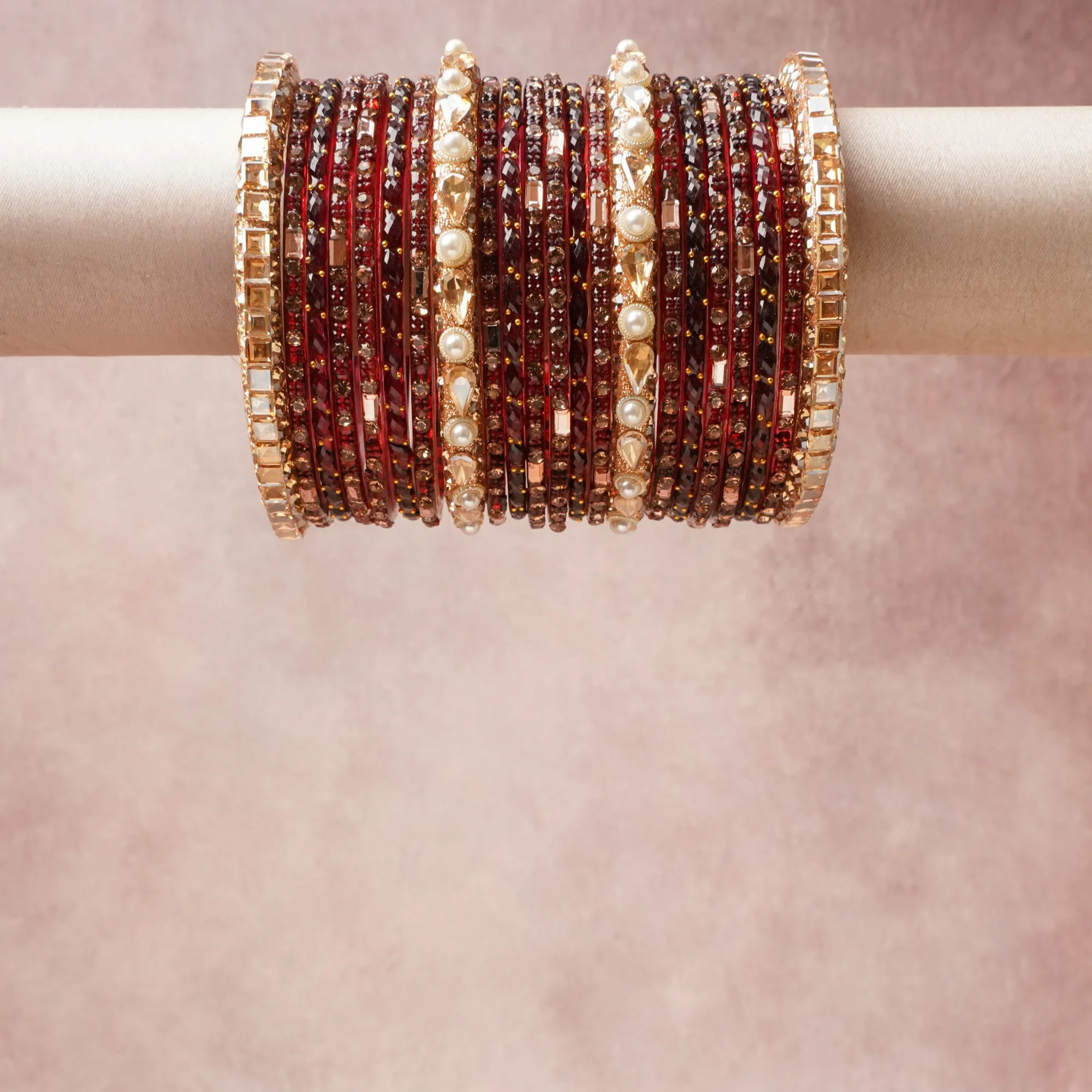 A grounding Burgundy Red forms the heart of the set, while touches of Rose Gold, Brilliant White, Pearl White, Champagne Crystal add charm.

A thoughtful composition of Glass, Metal Alloy, Faceted Crystal, Faux Pearls, designed to feel complete without being heavy.
Each element layers seamlessly, creating a look that is refined, wearable and quietly striking.